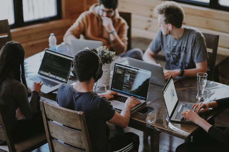 Web development team collaborating on a company website project